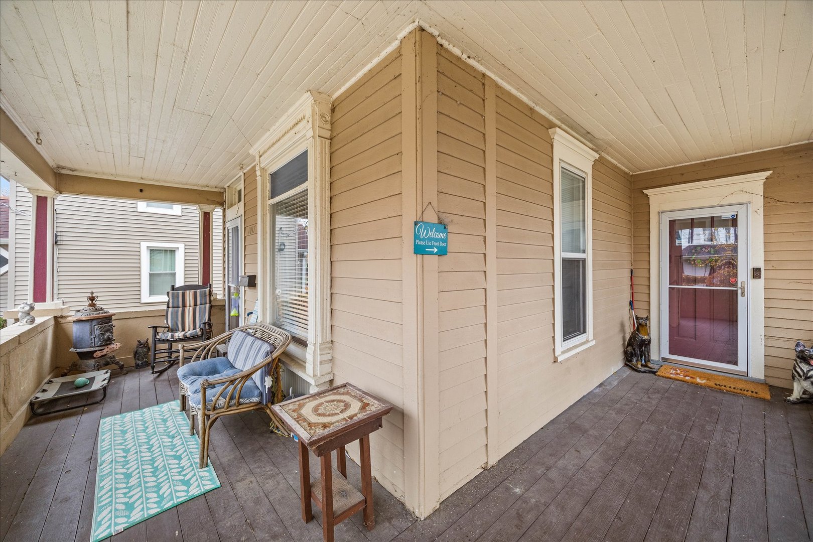 1017 Center Street Elgin, IL 60120 - Photo 4 of 27 a balcony with furniture and large window