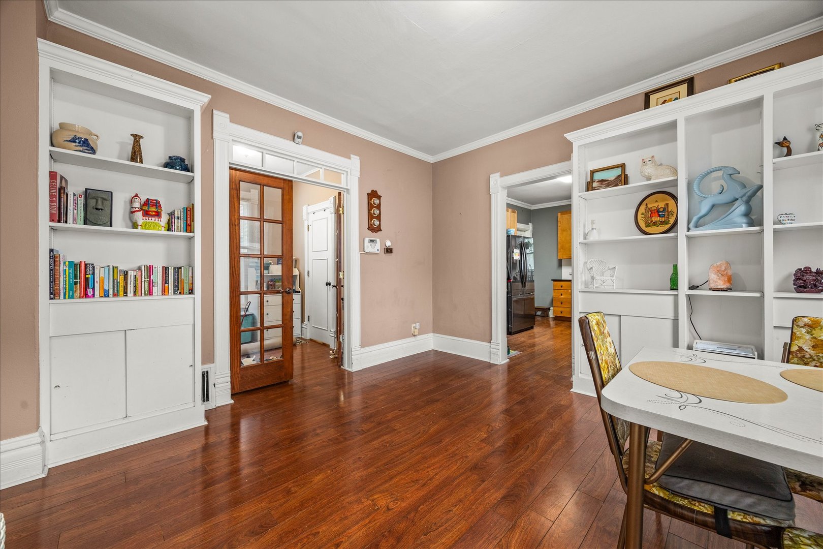 1017 Center Street Elgin, IL 60120 - Photo 7 of 27 a view of a dining area with furniture and wooden floor
