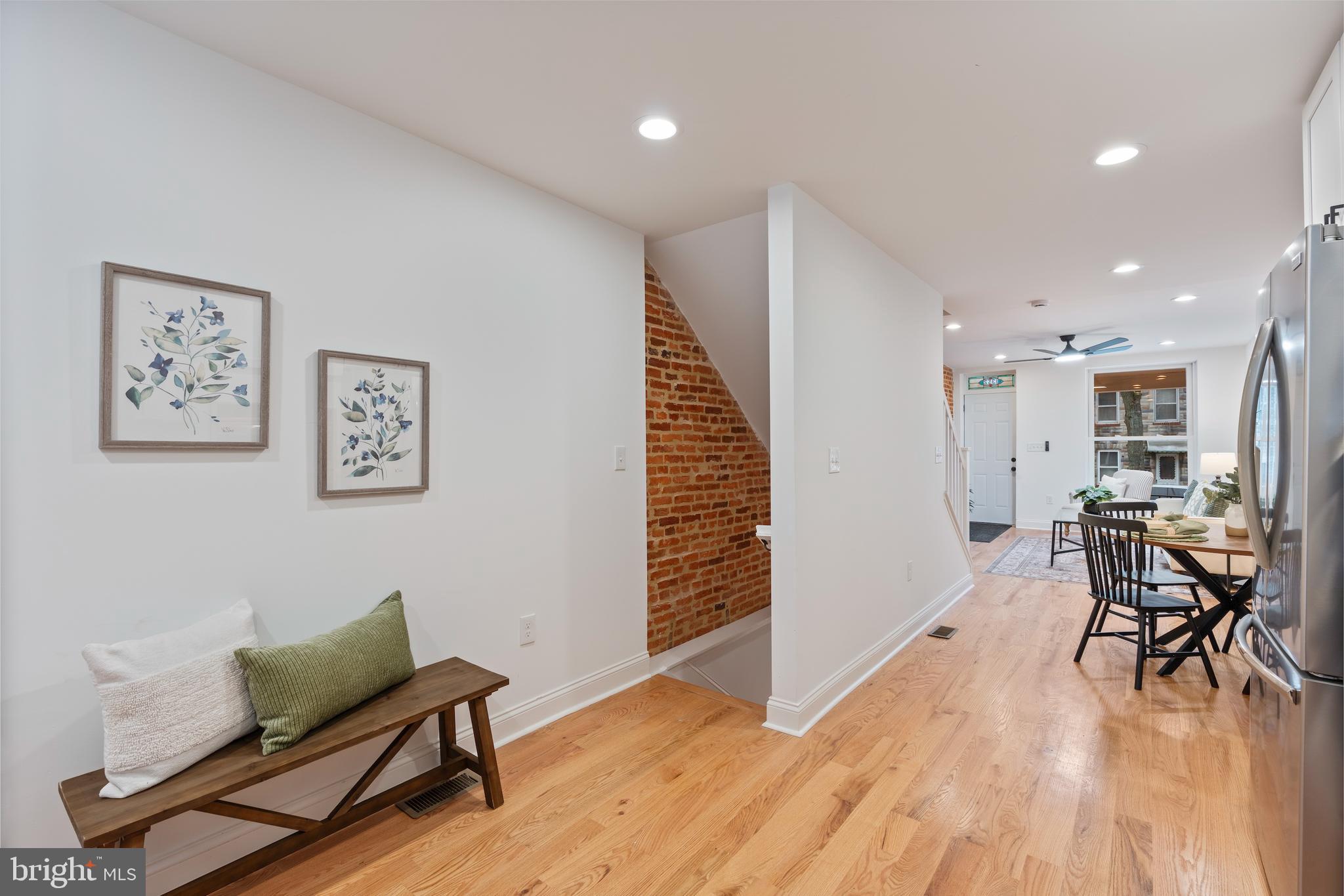 1352 Andre Street Baltimore, MD 21230 - Photo 14 of 52 a living room with furniture and wooden floor