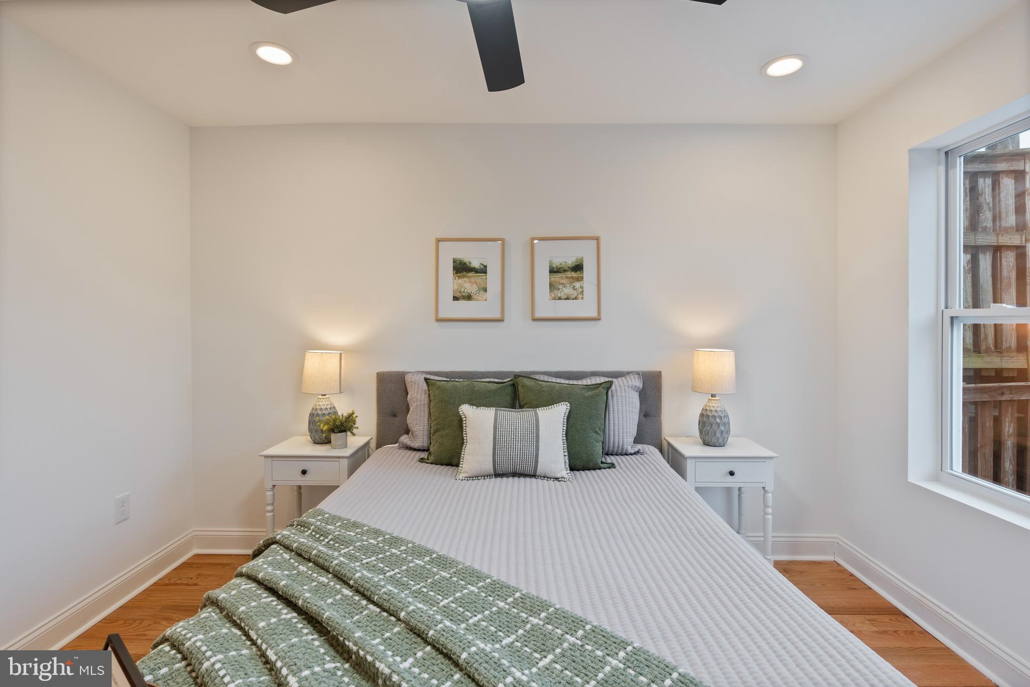 1352 Andre Street Baltimore, MD 21230 - Photo 16 of 52 a bedroom with bed and window