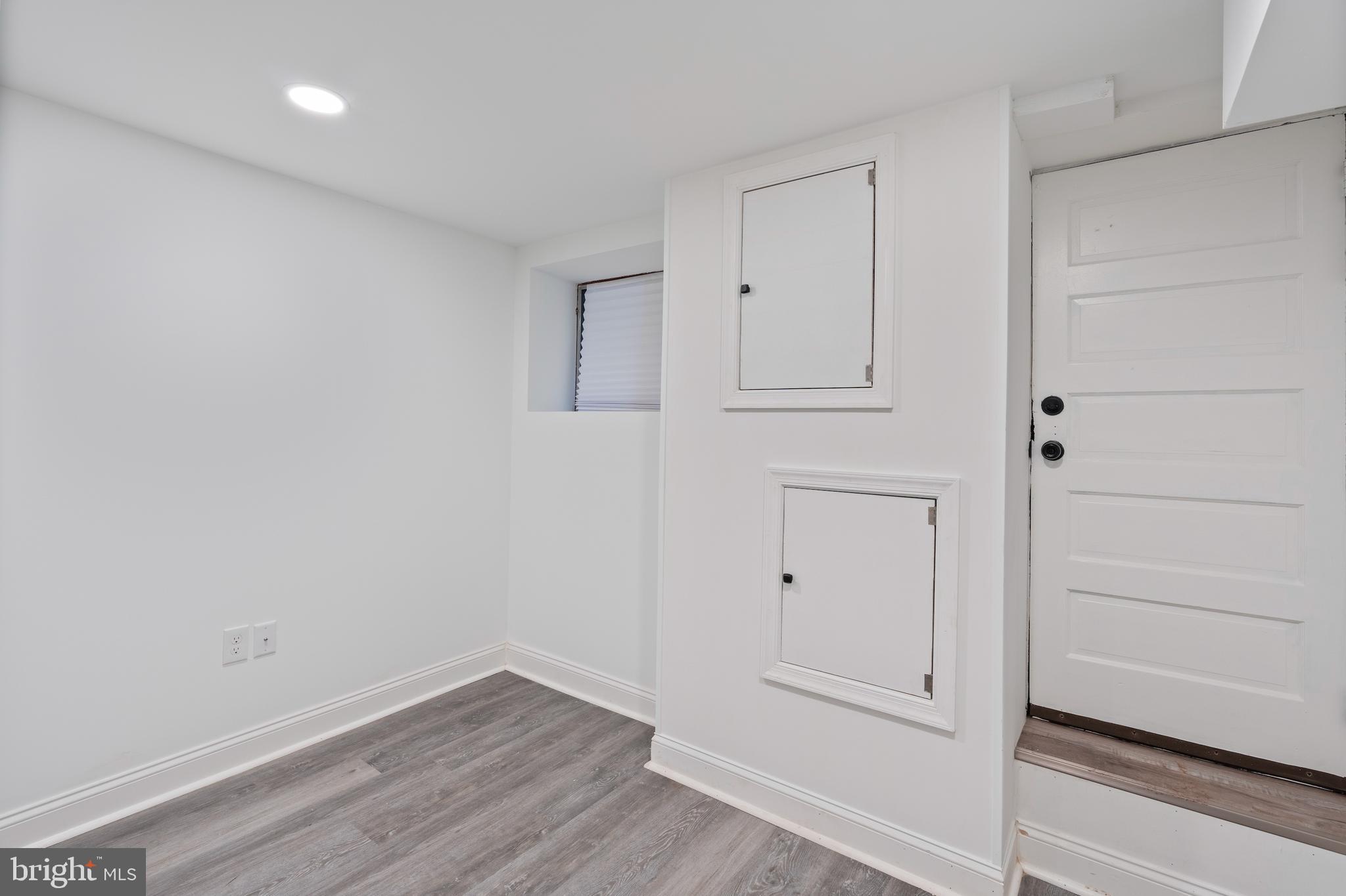 1352 Andre Street Baltimore, MD 21230 - Photo 23 of 52 wooden floor in an empty room