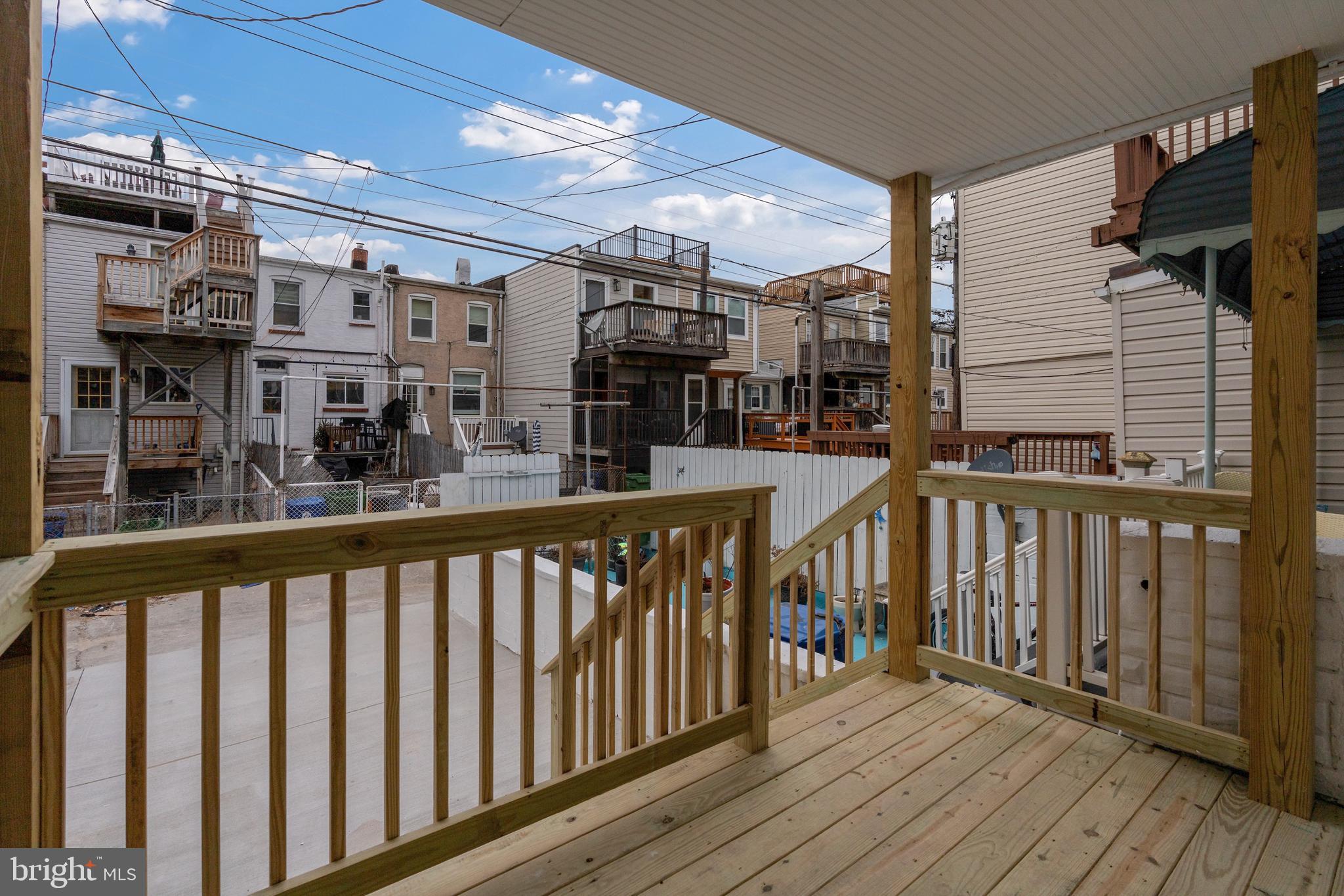 1352 Andre Street Baltimore, MD 21230 - Photo 39 of 52 a view of a balcony with wooden floor