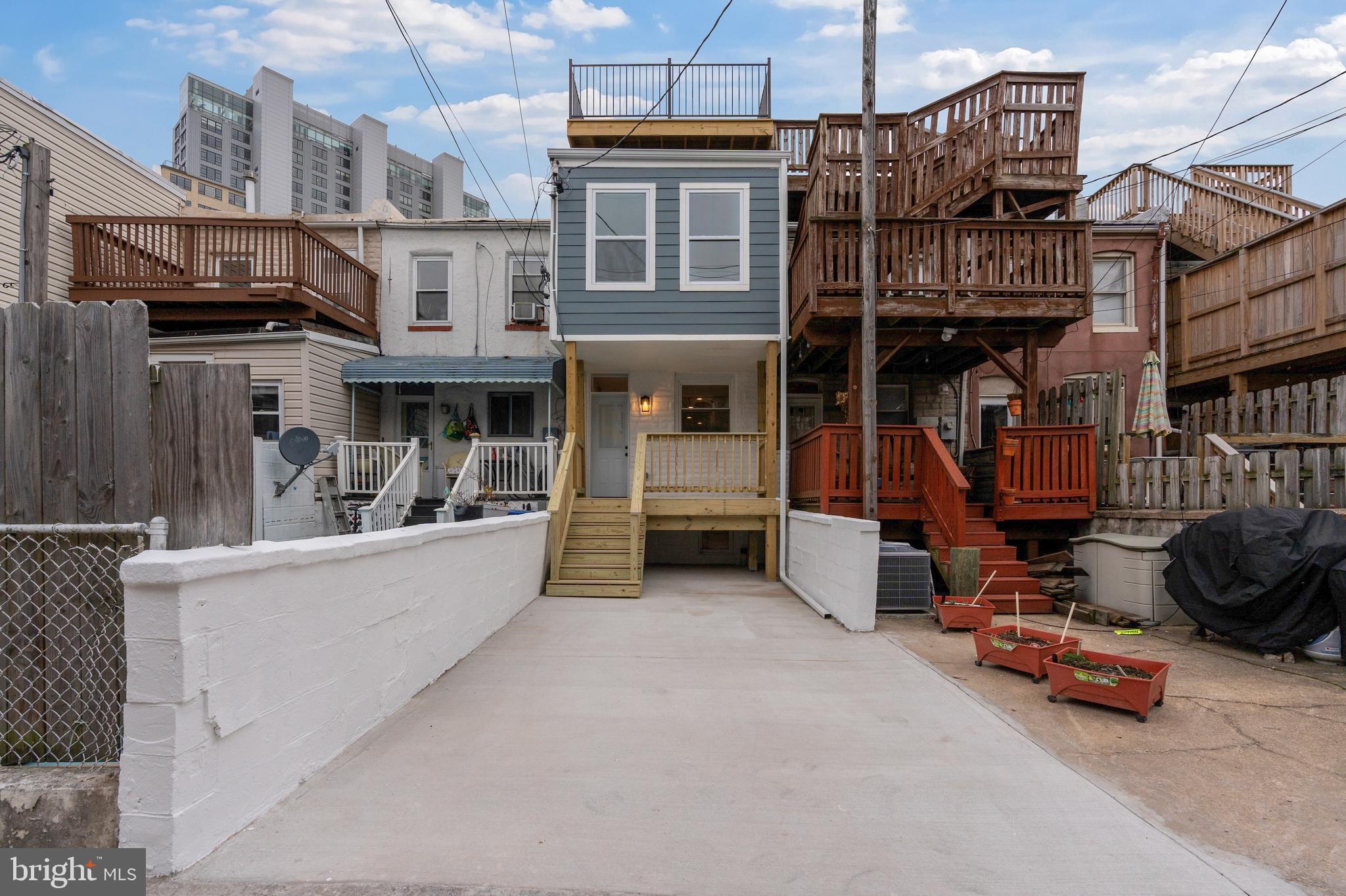 1352 Andre Street Baltimore, MD 21230 - Photo 44 of 52 a view of a street with tall buildings