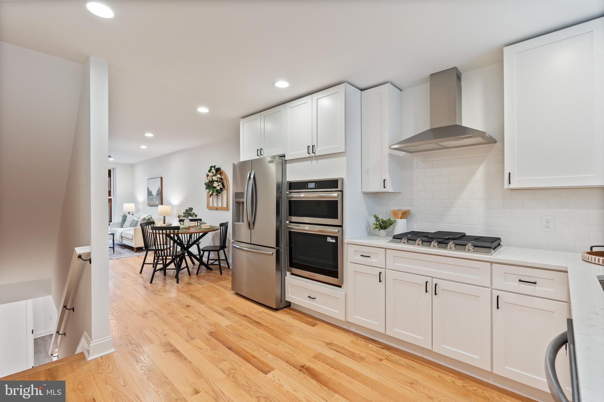 1352 Andre Street Baltimore, MD 21230 - Photo 9 of 52 a kitchen with stainless steel appliances a stove a sink and a refrigerator