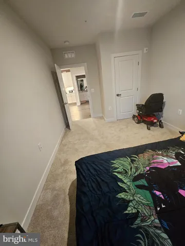 a view of a livingroom with wooden floor