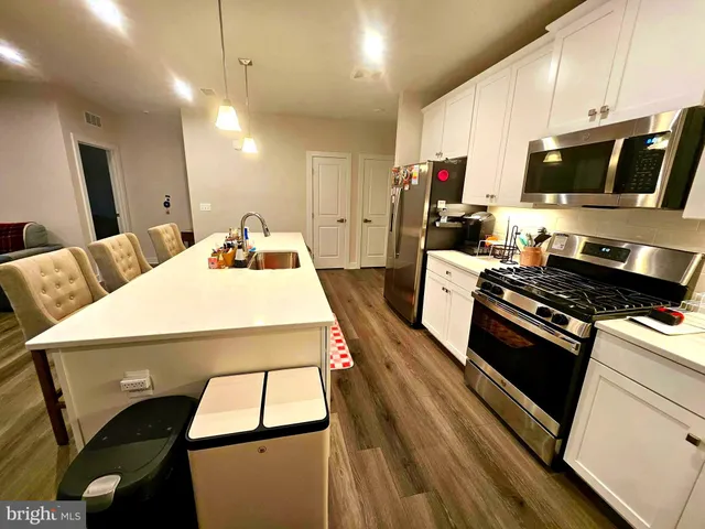 a view of empty room with racks on the wall