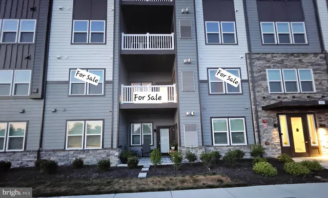 a front view of a house having yard