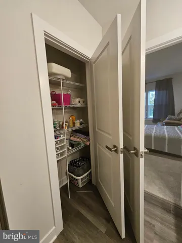 a bathroom with a sink and glass door