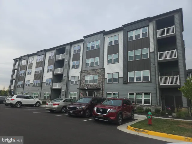 a view of swimming pool with outdoor space and seating area