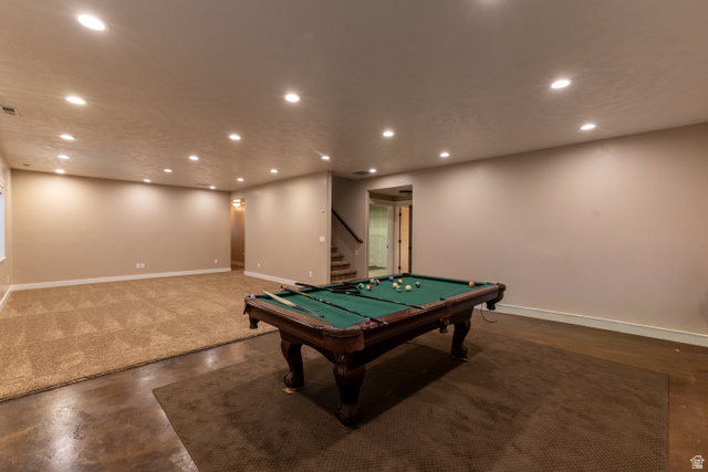 3565 West 1350th Street North Vernal, UT 84078 - Photo 41 of 54 Spacious room featuring diverse flooring, recessed lighting, and ample wall space