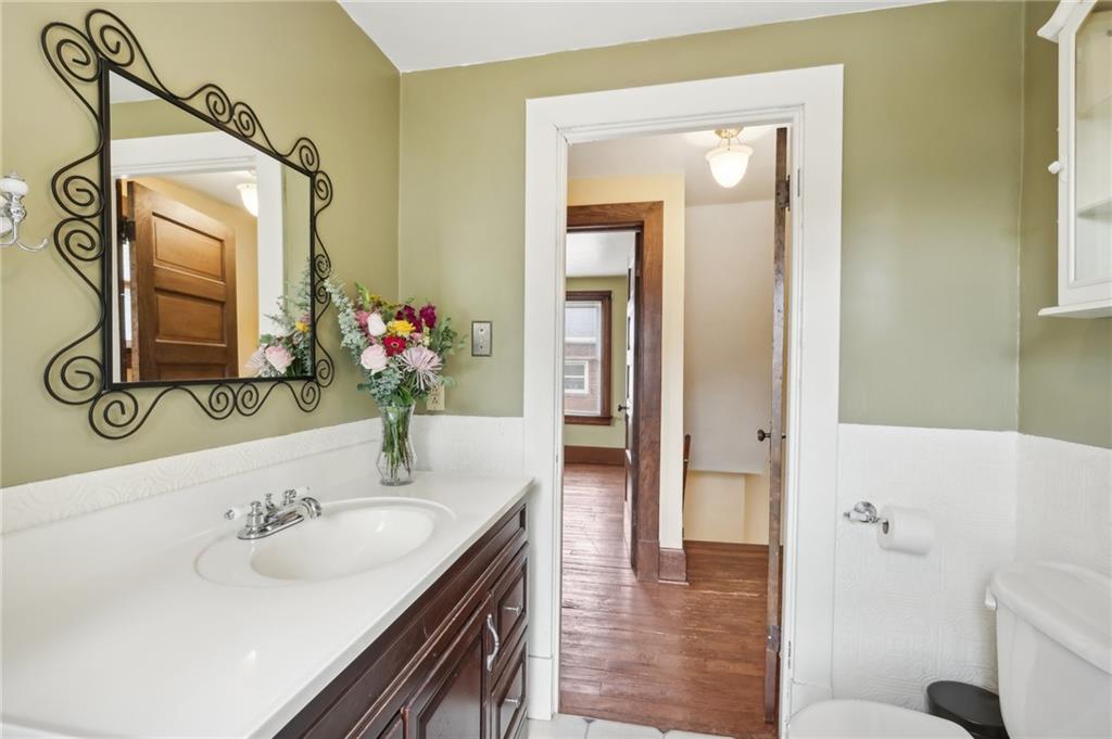 313 Pine Street Zelienople, PA 16063 - Photo 24 of 42 a bathroom with a sink and a mirror