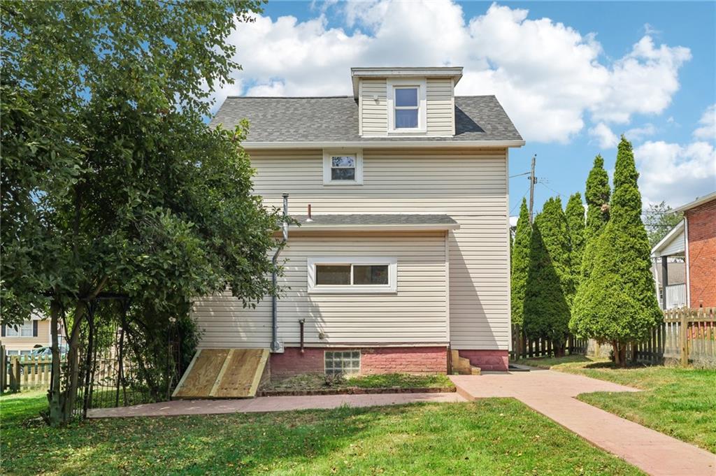 313 Pine Street Zelienople, PA 16063 - Photo 34 of 42 a view of a house with a yard