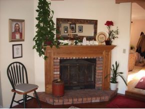 1806 Pony Soldier Road Prescott, AZ 86303 - Photo 6 of 9 a living room with furniture and a fireplace