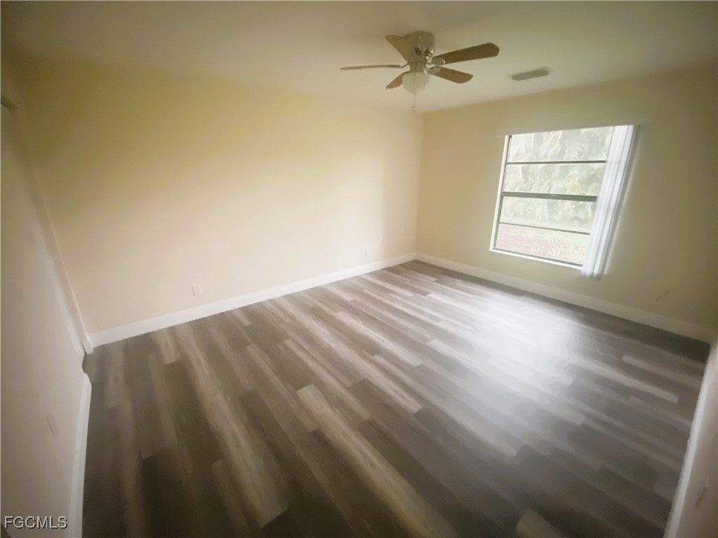2247-2249 Violet Drive, Unit 2247 Fort Myers, FL 33905 - Photo 9 of 9 a view of an empty room and a window
