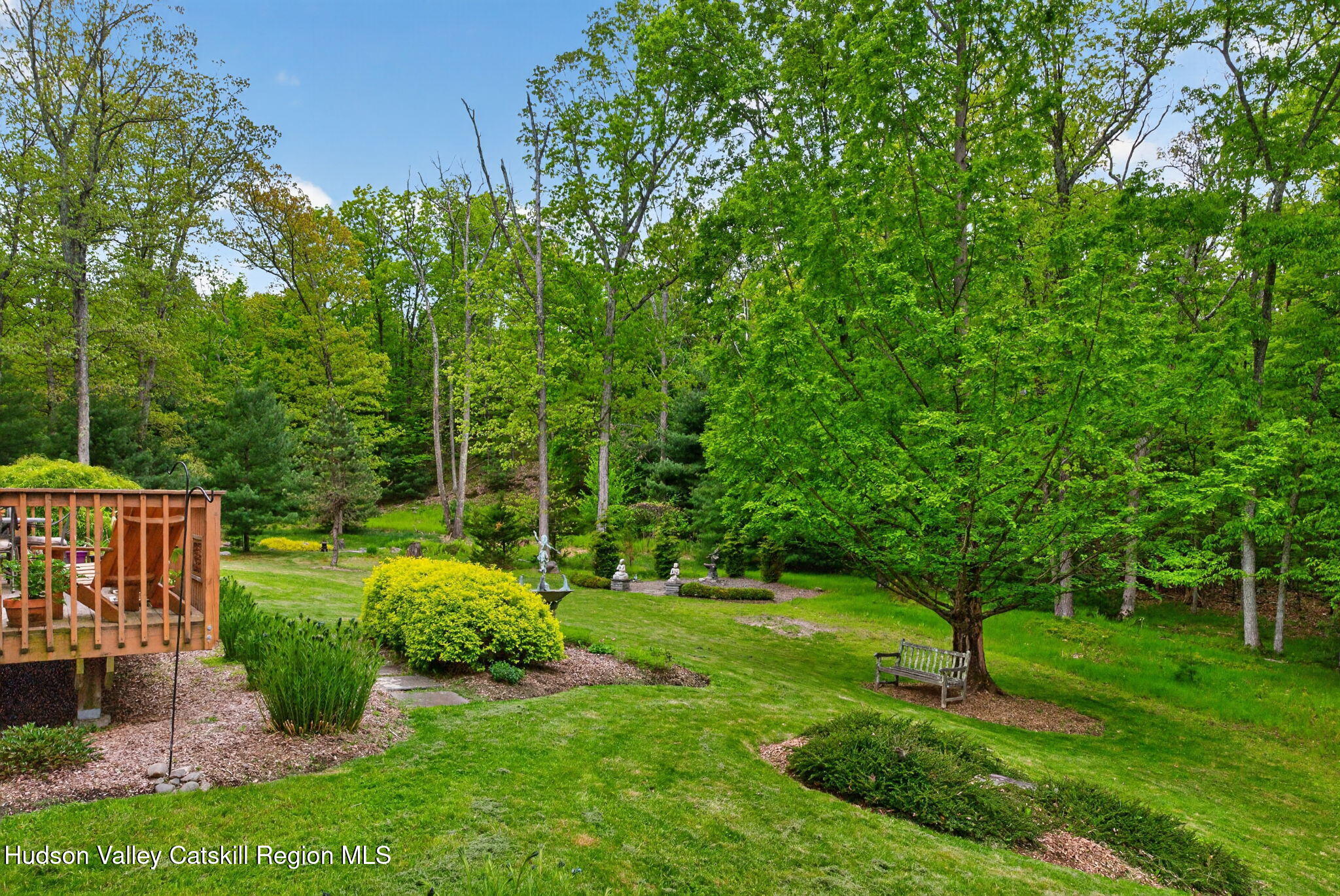 189 Bush Road Stone Ridge, NY 12484 - Photo 50 of 60 a view of a garden with a slide
