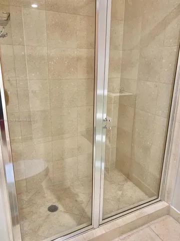 a bathroom with a sink and a shower