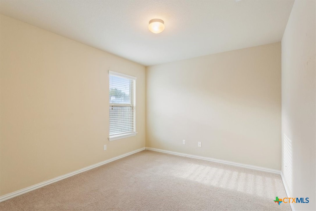 4019 Brookhaven Drive Temple, TX 76504 - Photo 21 of 25 a view of an empty room with a window