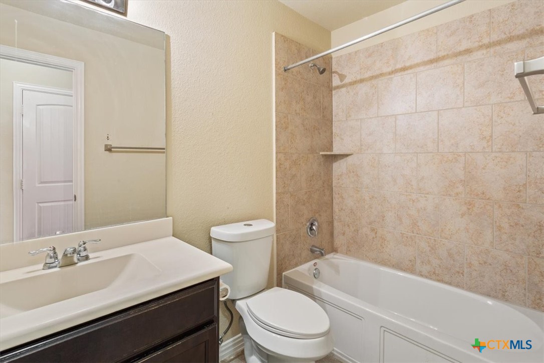 4019 Brookhaven Drive Temple, TX 76504 - Photo 22 of 25 a bathroom with a sink a toilet and shower