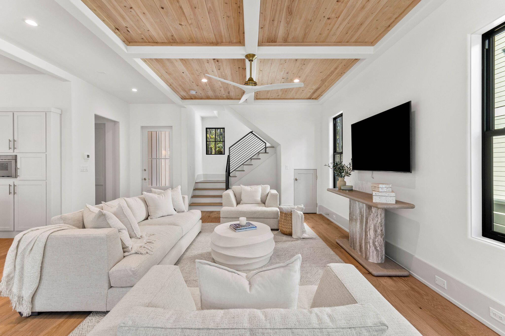 143 Redbud Ln Inlet Beach Inlet Beach, FL 32461 - Photo 13 of 62 a living room with furniture a flat screen tv and a chandelier