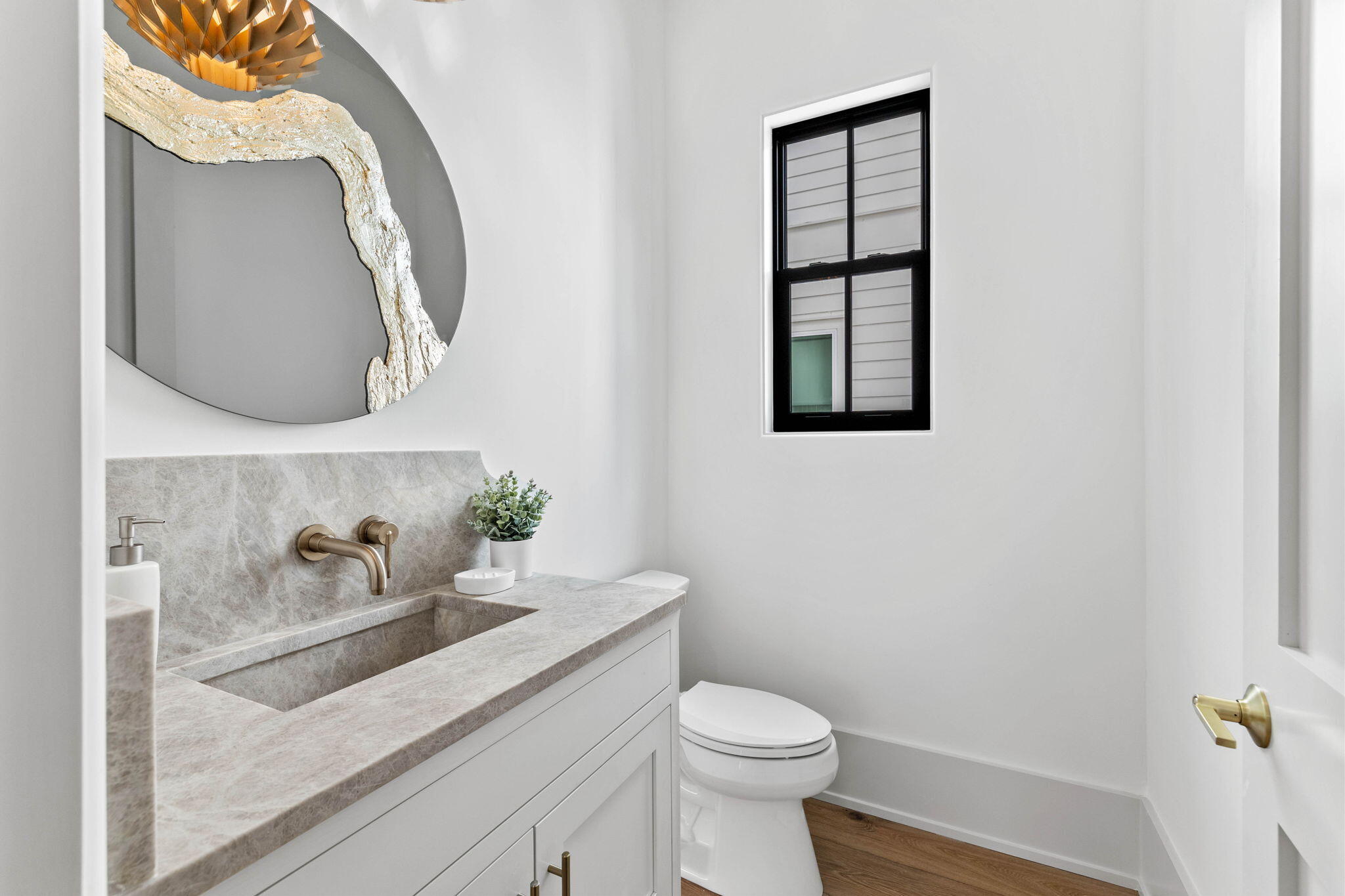 143 Redbud Ln Inlet Beach Inlet Beach, FL 32461 - Photo 15 of 62 a bathroom with a toilet sink and mirror