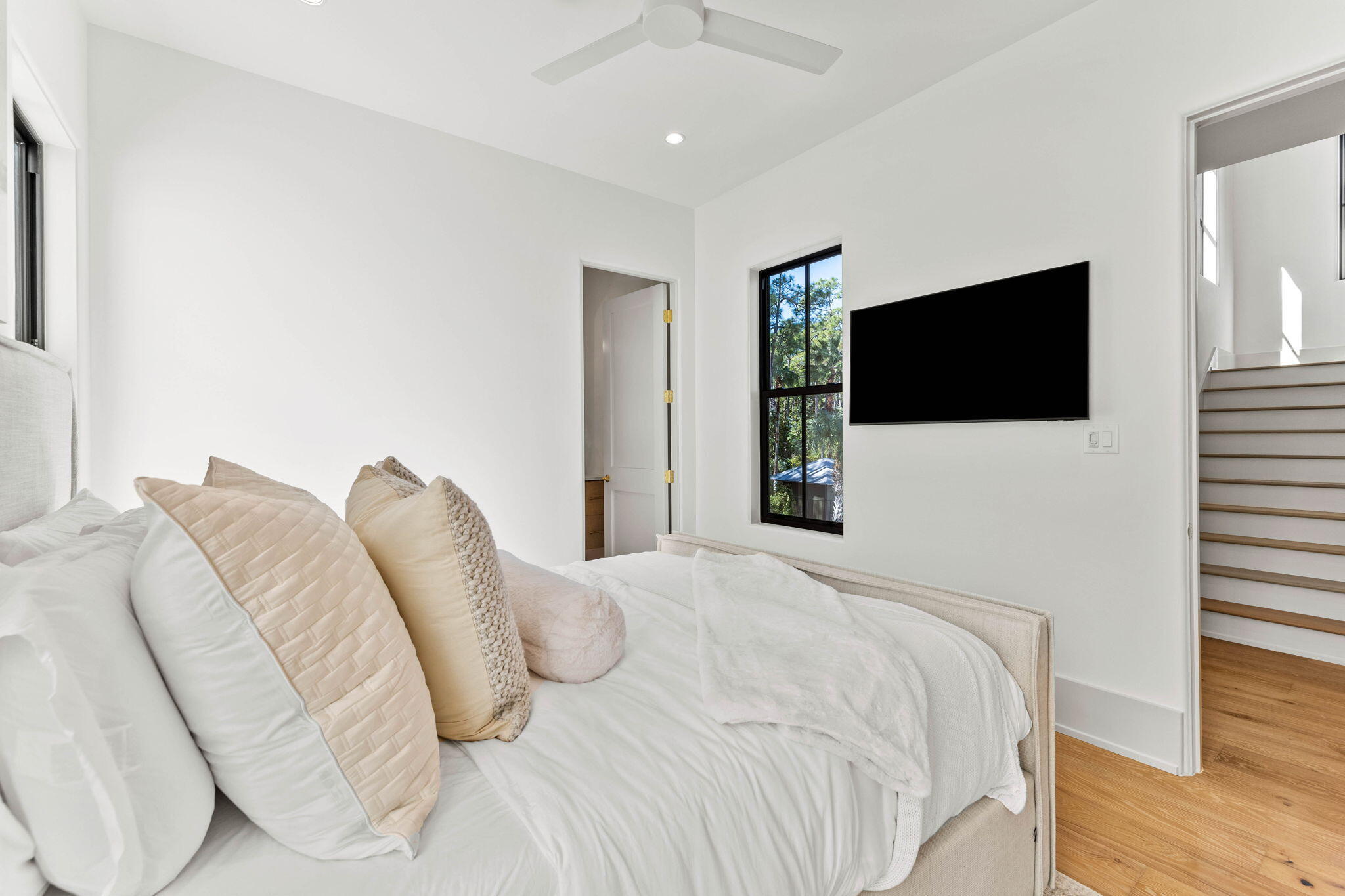 143 Redbud Ln Inlet Beach Inlet Beach, FL 32461 - Photo 27 of 62 a bedroom with a bed and a flat screen tv
