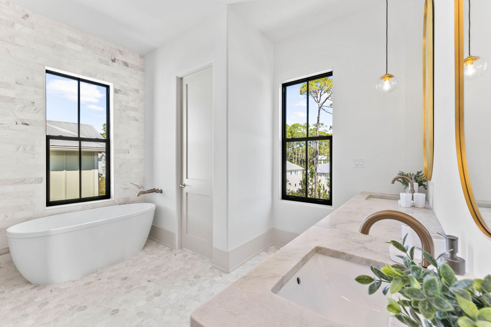 143 Redbud Ln Inlet Beach Inlet Beach, FL 32461 - Photo 43 of 62 a bath tub sitting in a bathroom next to a window