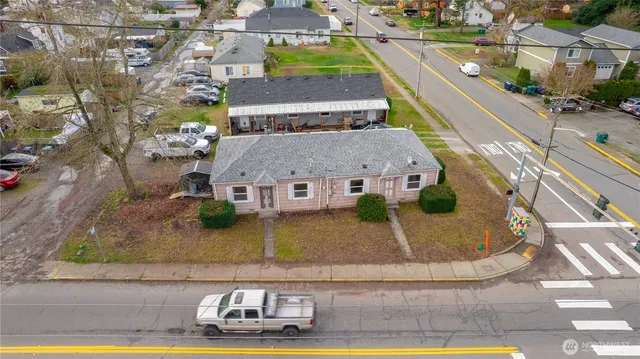 an aerial view of a house with swimming pool