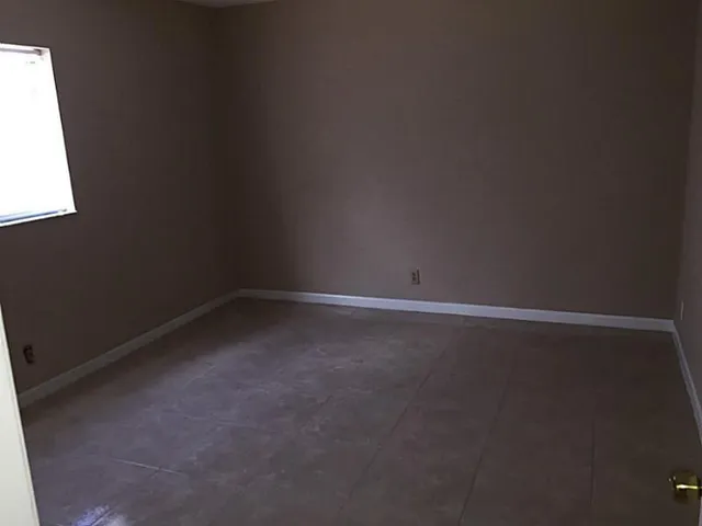 an empty room with a window