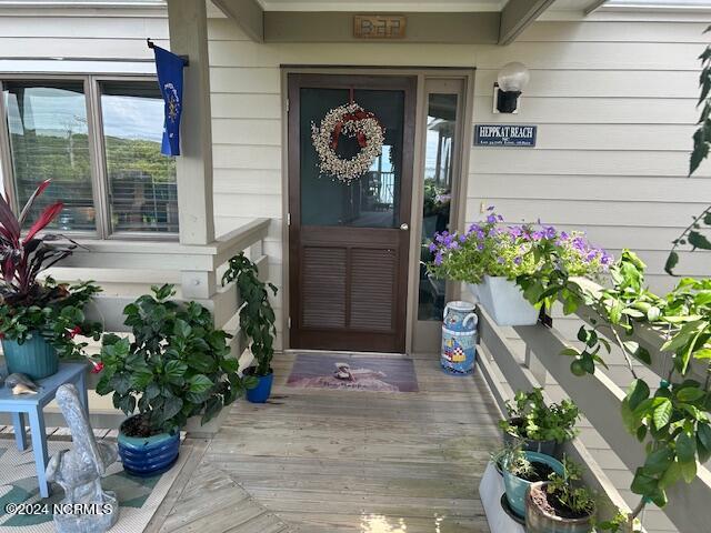 497 Salter Path Road, Unit B22 Pine Knoll Shores, NC 28512 - Photo 3 of 36 Front Door