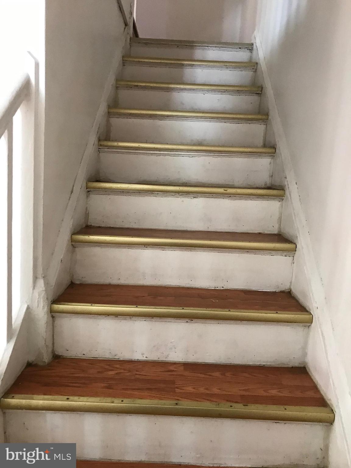 734 Roundview Road Baltimore, MD 21225 - Photo 14 of 22 Staircase to second floor