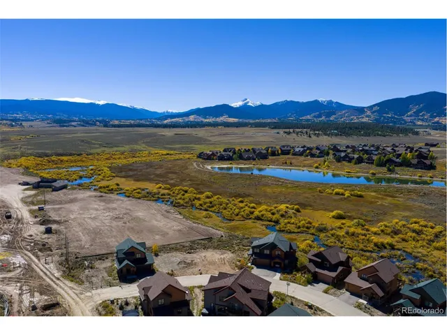 a view of an ocean and a mountain