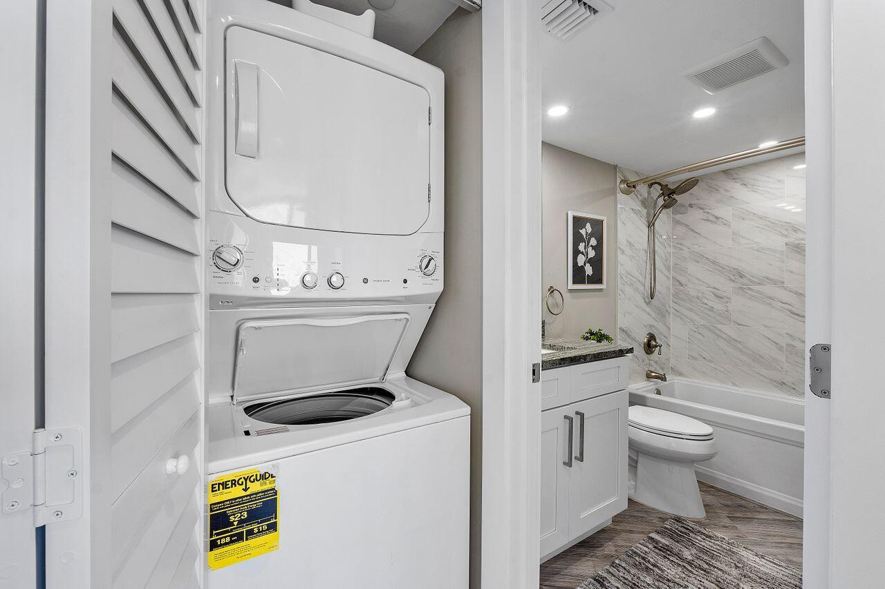 200 Ocean Trail Way, Unit 602 Jupiter, FL 33477 - Photo 25 of 50 a bathroom with a sink a toilet and shower