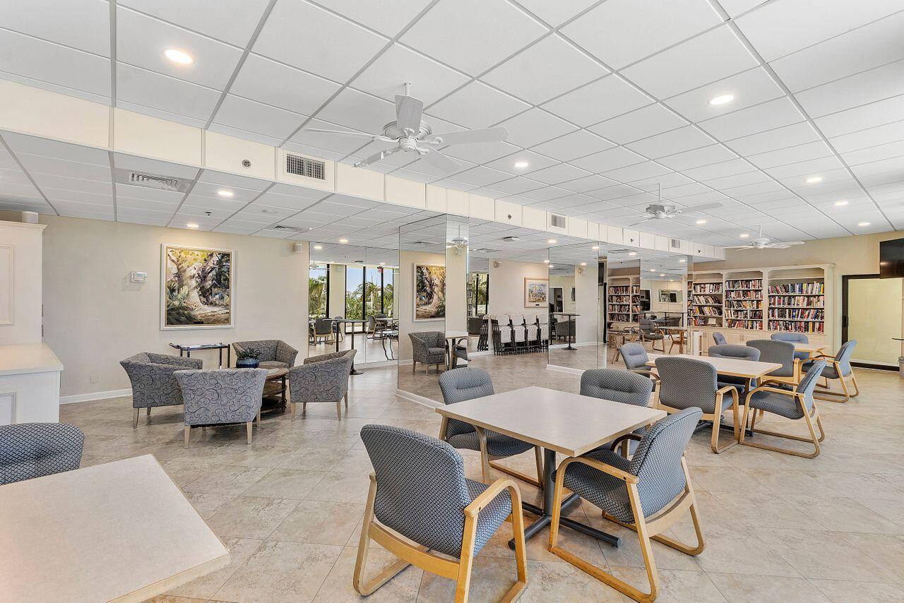 200 Ocean Trail Way, Unit 602 Jupiter, FL 33477 - Photo 43 of 50 a dining room with lots of tables and chairs
