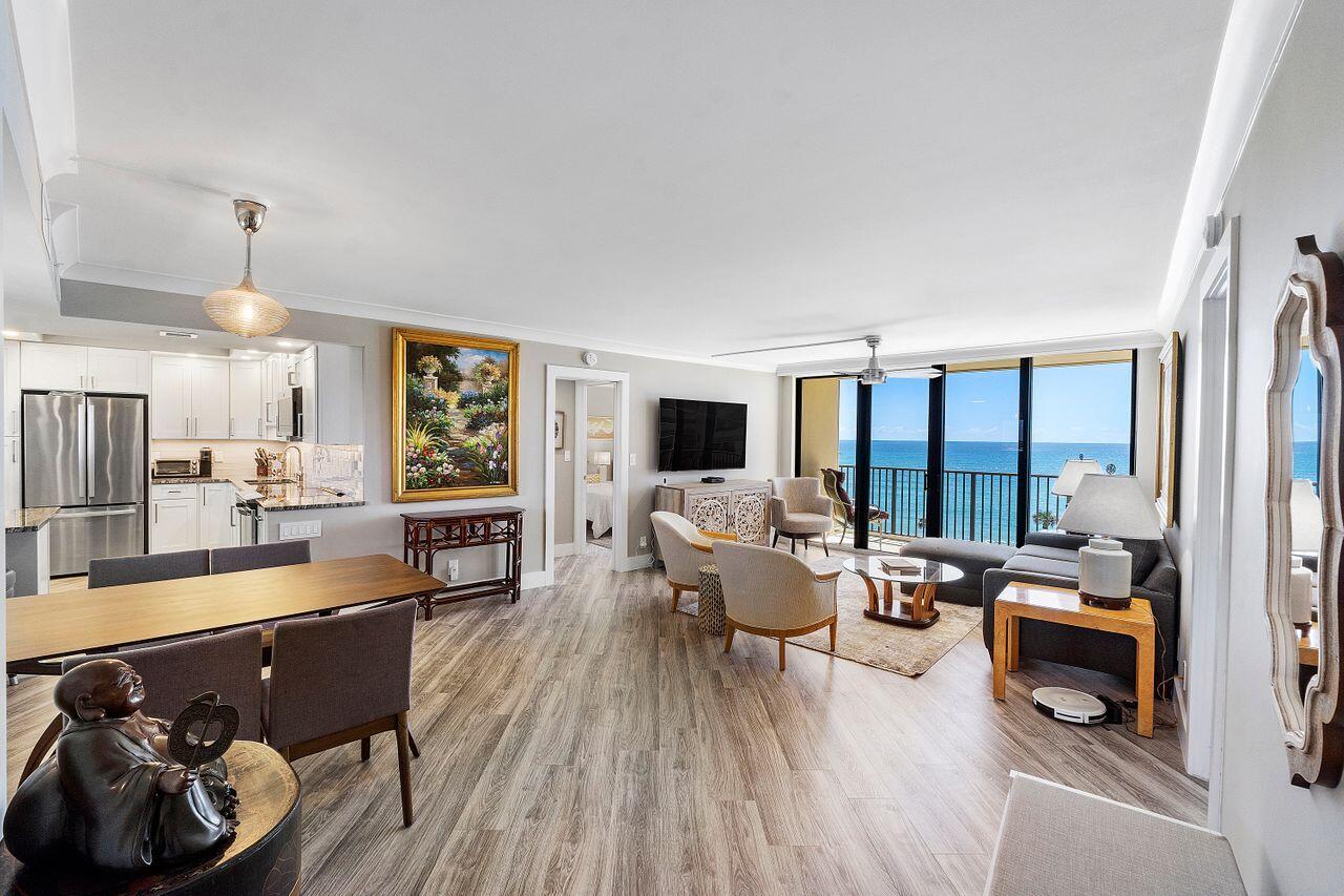 200 Ocean Trail Way, Unit 602 Jupiter, FL 33477 - Photo 6 of 50 a living room with furniture and a wooden floor