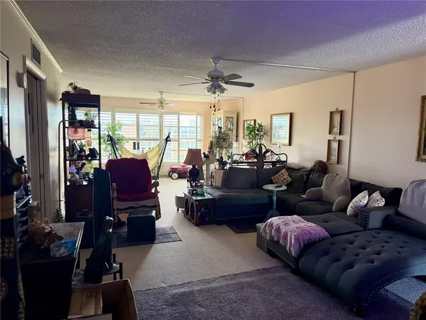 a room with furniture and a large window
