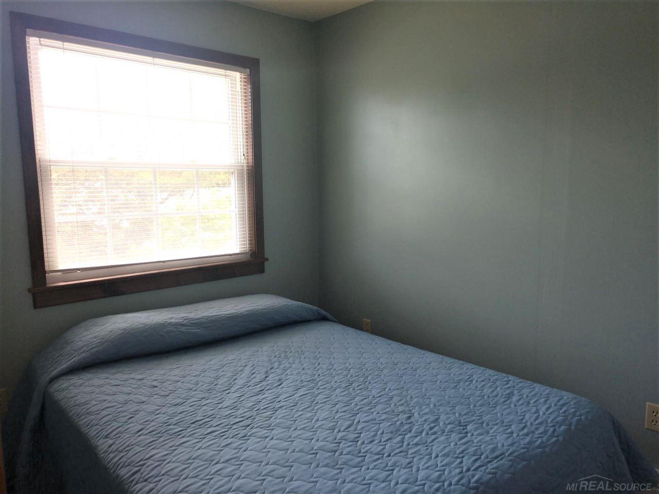 7290 Longfellow Road Lexington, MI 48450 - Photo 17 of 28 Second floor bedroom