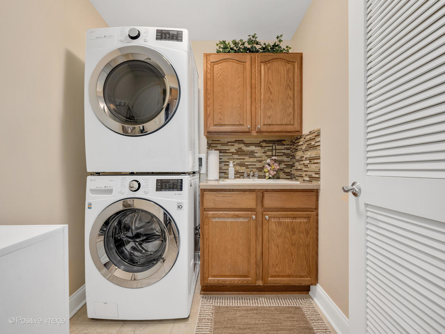 1 Itasca Place, Unit 306 Addison, IL 60143 - Photo 16 of 24 a utility room with dryer and washer
