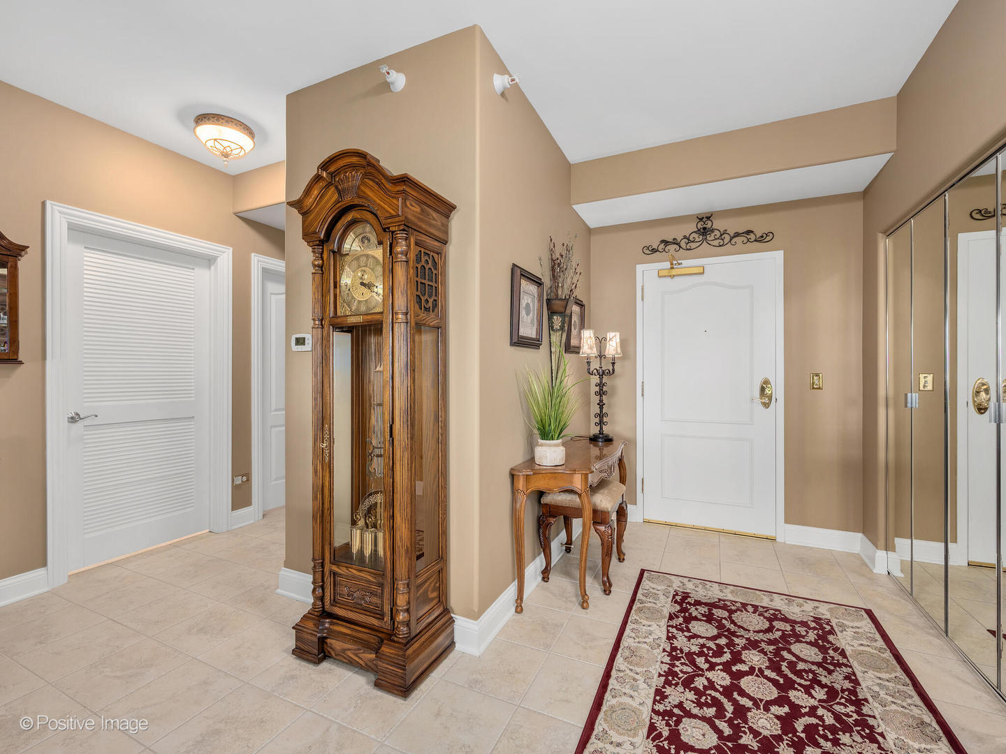 1 Itasca Place, Unit 306 Addison, IL 60143 - Photo 5 of 24 a view of a hallway with a livingroom and closet