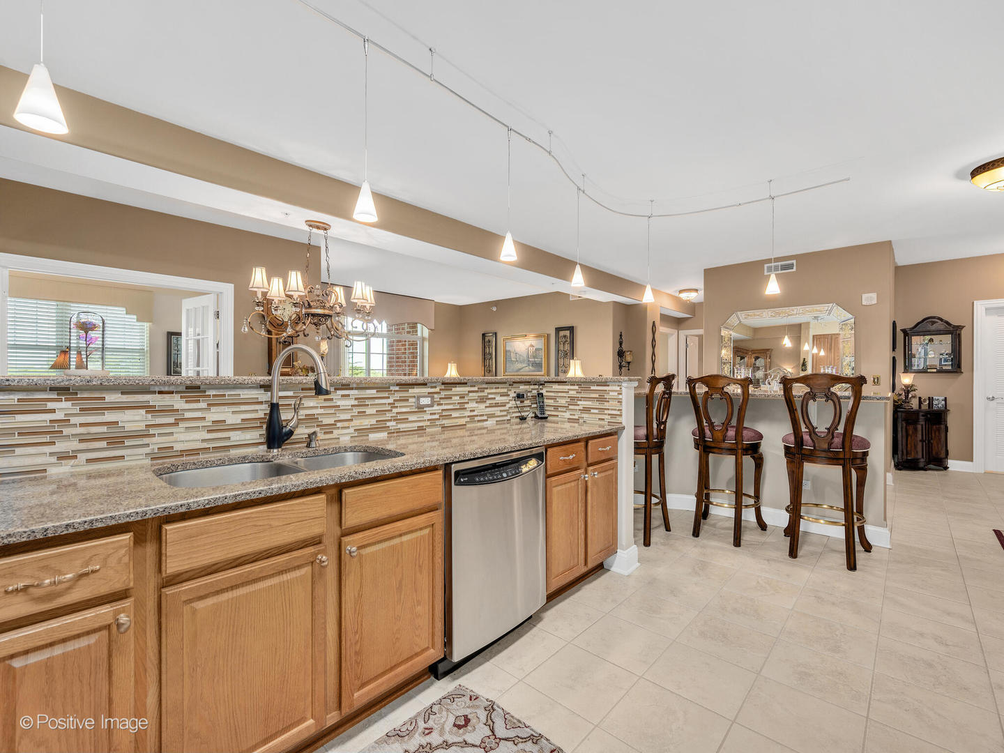 1 Itasca Place, Unit 306 Addison, IL 60143 - Photo 9 of 24 a large kitchen with lots of counter space