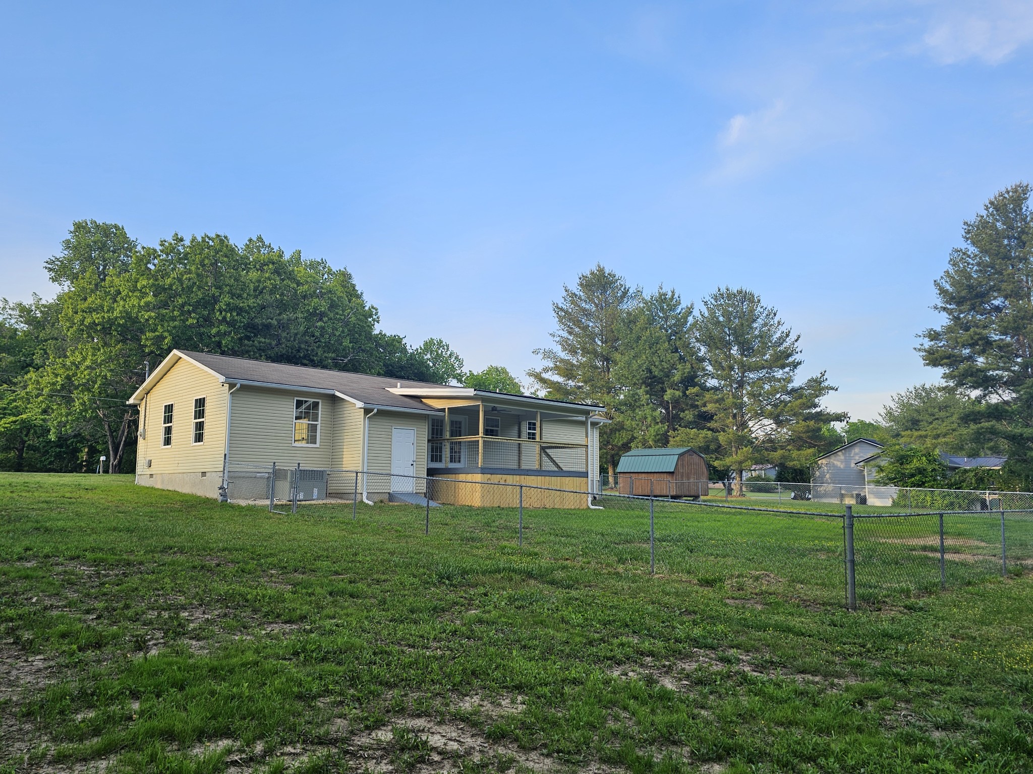 362 Forest Point Road Monteagle, TN 37356 - Photo 12 of 42 a view of a house with a yard