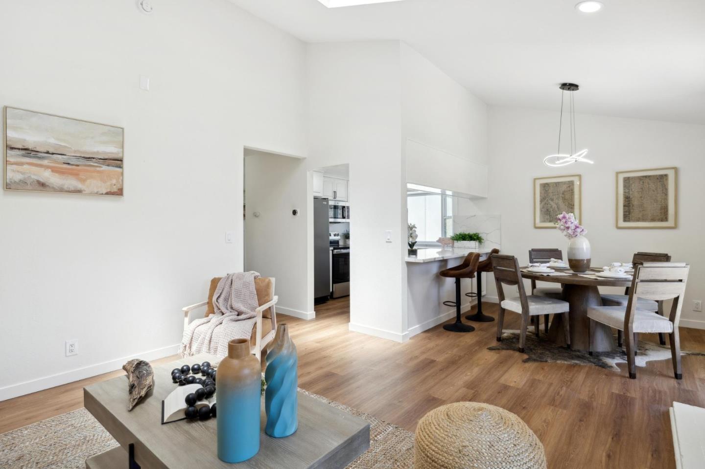 10892 Northfield Square Cupertino, CA 95014 - Photo 14 of 78 a view of a livingroom with furniture and a kitchen