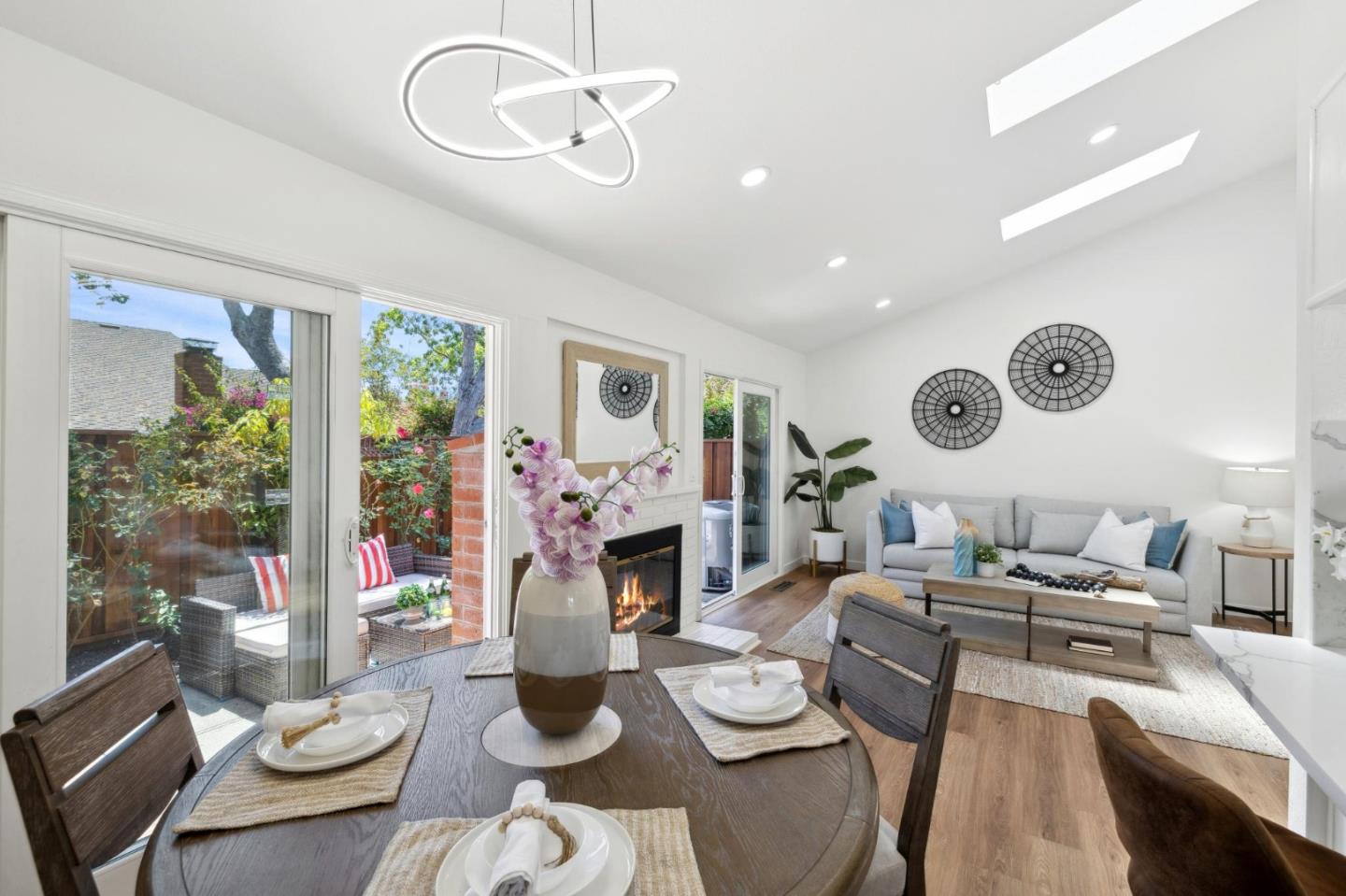 10892 Northfield Square Cupertino, CA 95014 - Photo 15 of 78 a living room with furniture kitchen view and a large window