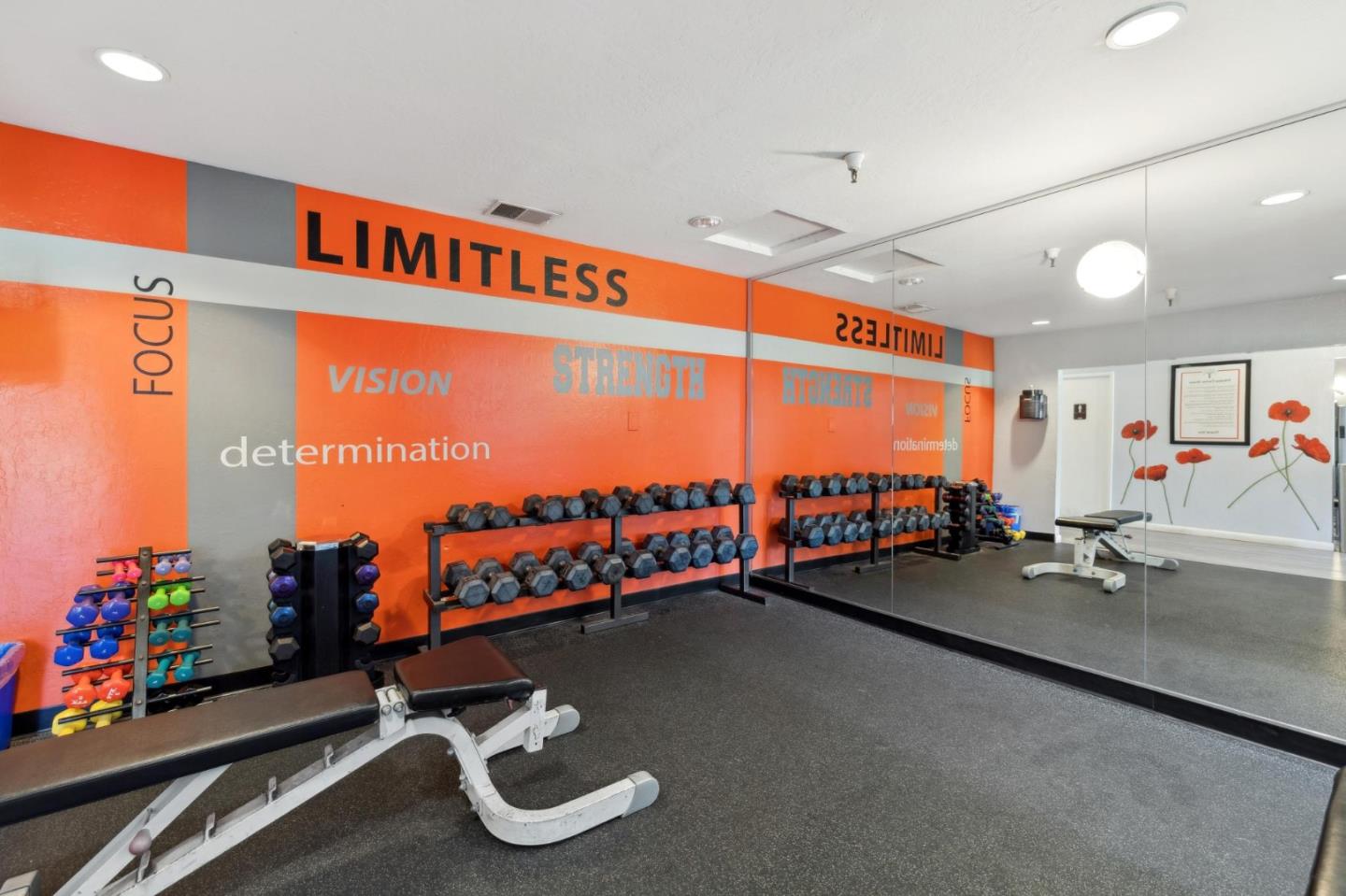 10892 Northfield Square Cupertino, CA 95014 - Photo 47 of 78 a room with gym equipment and a large window