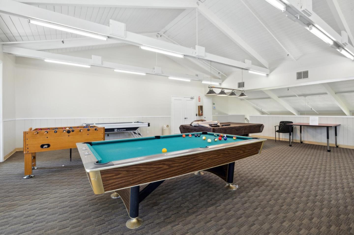 10892 Northfield Square Cupertino, CA 95014 - Photo 58 of 78 a room with furniture and air hockey table