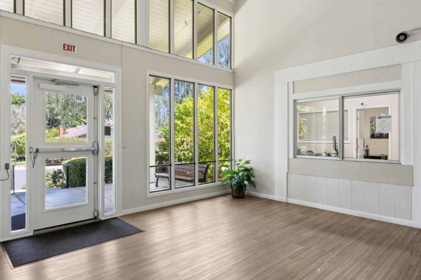 10892 Northfield Square Cupertino, CA 95014 - Photo 66 of 78 a view of an entryway with wooden floor and windows