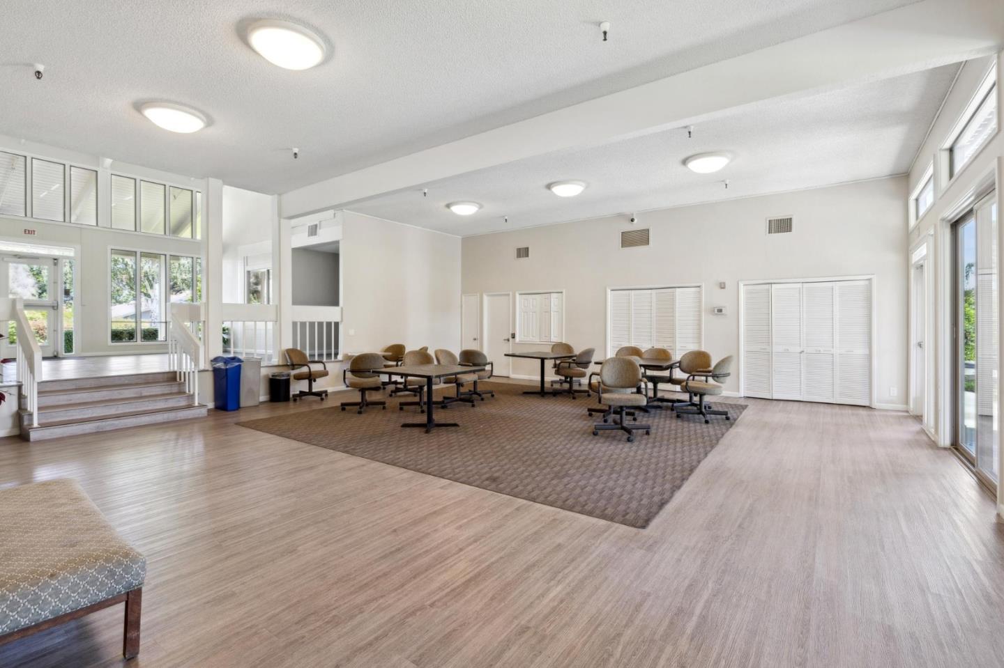 10892 Northfield Square Cupertino, CA 95014 - Photo 67 of 78 a living room with furniture and wooden floor