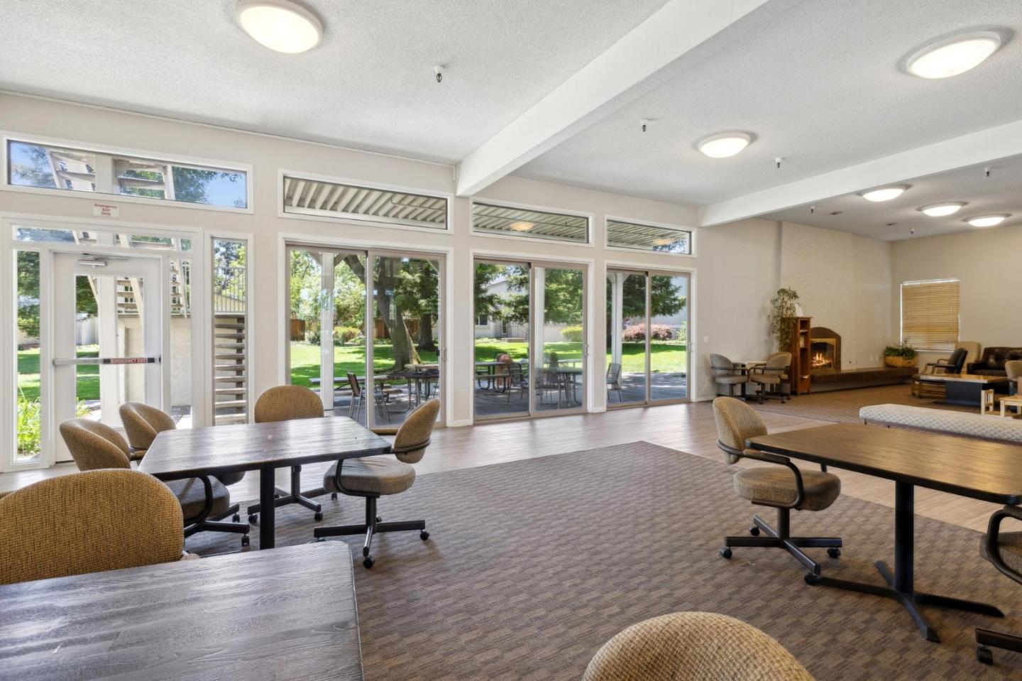 10892 Northfield Square Cupertino, CA 95014 - Photo 68 of 78 a living room with furniture and a table