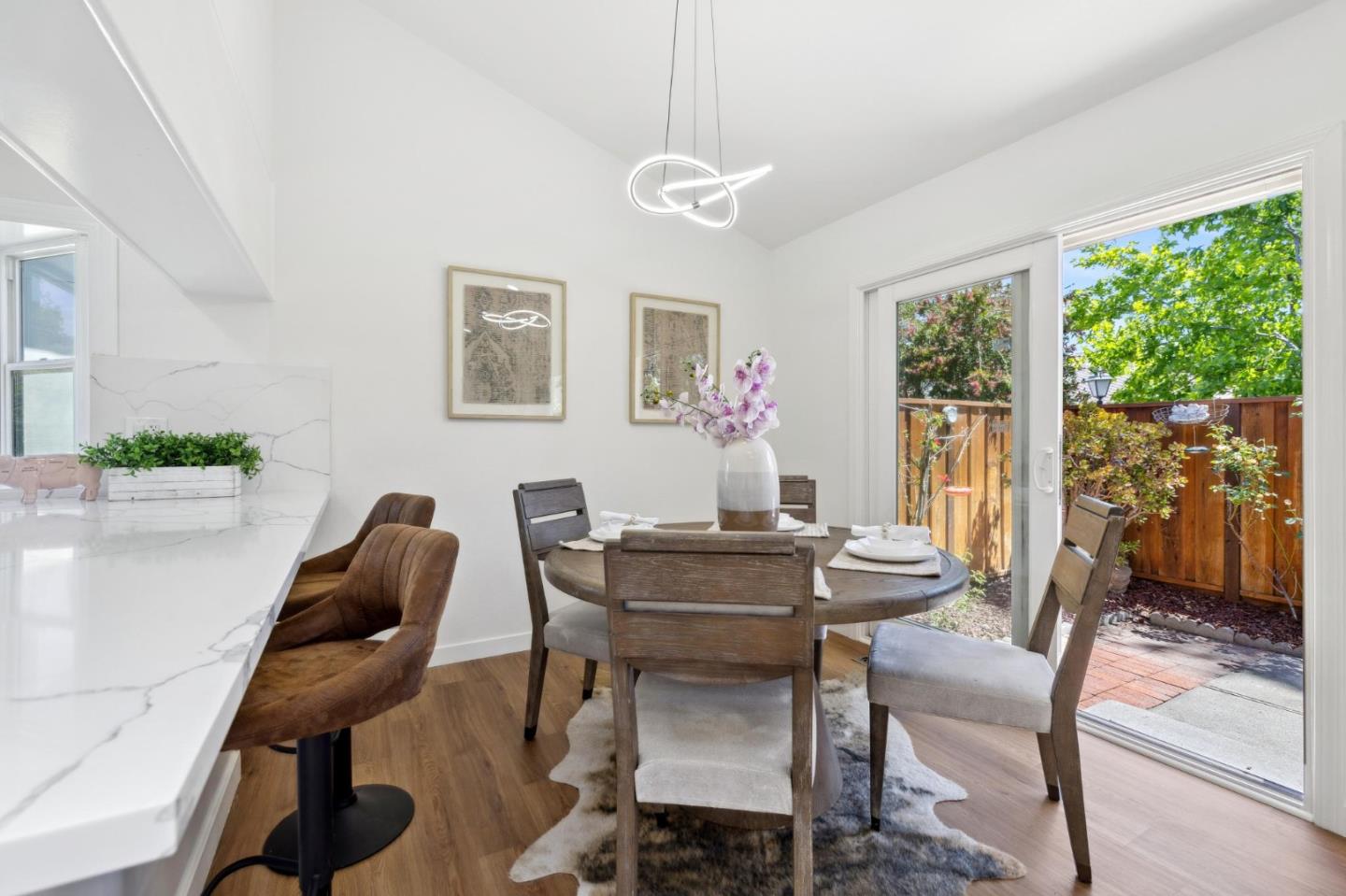 10892 Northfield Square Cupertino, CA 95014 - Photo 10 of 78 a view of a dining room with furniture window and outside view