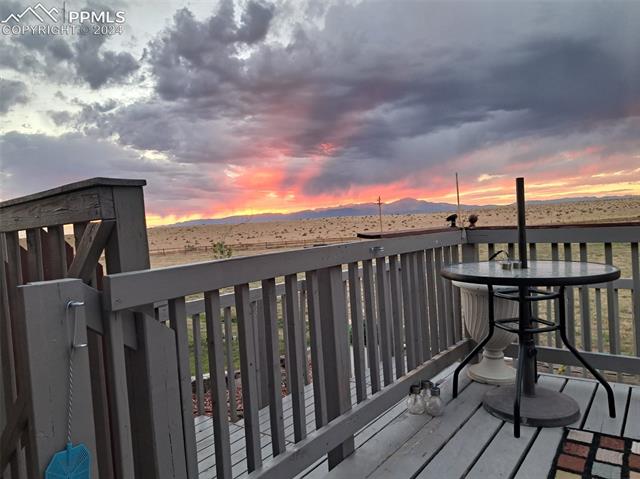 11025 Milne Road Colorado Springs, CO 80928 - Photo 40 of 41 Enjoy beautiful sunsets and mountain views!