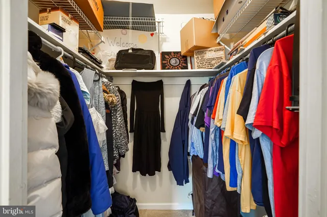 a close up view of a walk in closet